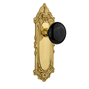 Victorian Long Plate with Black Porcelain Knob in Unlacquered Brass